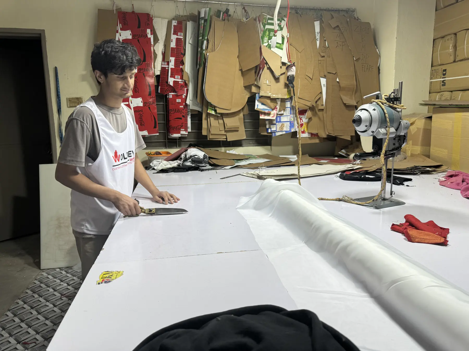 Fabric cutting at Wolfiey Wear